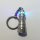 Schlüsselanhänger Messing verchromt - Blinkender Leuchtturm antik H=5,5 cm - 3 Knopfzellen LR41